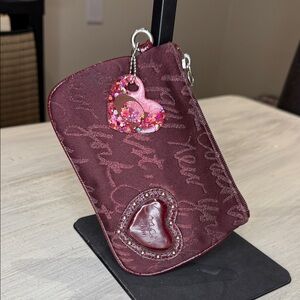 Coach Burgundy Wristlet with Heart Charm